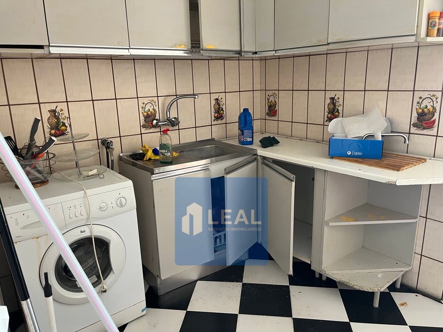 Vivienda y local en calle Sevilla y NIV 4